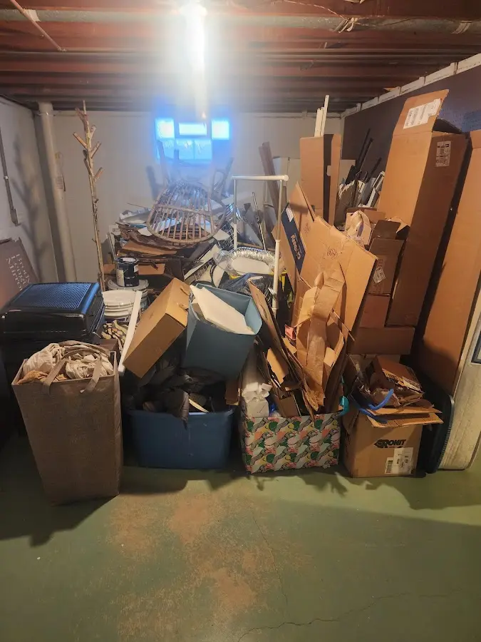 Roll-off dumpster container at job site for Construction Dumpster Rental in Crittenden